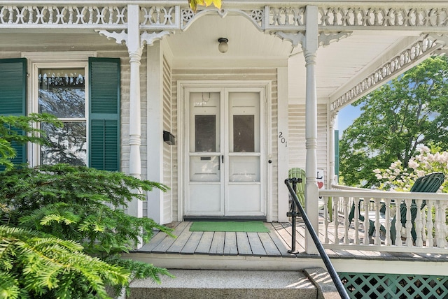 201 Main St, Norway, ME 04268 - doorway to property featuring a porch