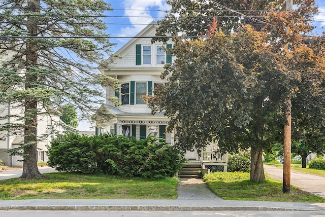 201 Main St, Norway, ME 04268 - view of front facade featuring covered porch