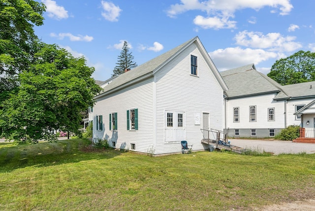 201 Main St, Norway, ME 04268 - back of property featuring a yard and a shingled roof