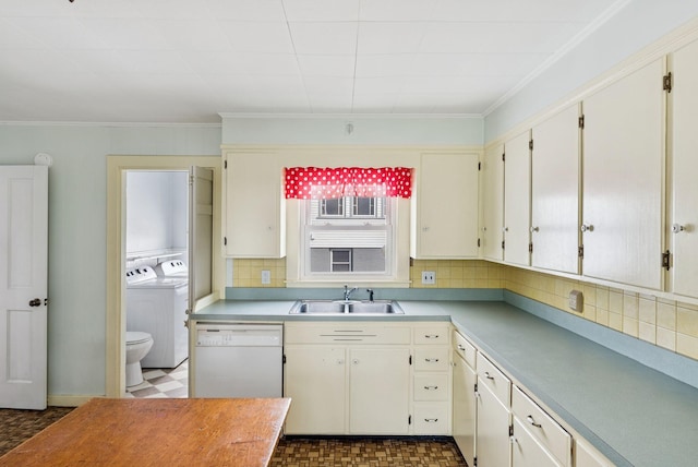 201 Main St, Norway, ME 04268 - kitchen with separate washer and dryer, dishwasher, light countertops, crown molding, and backsplash