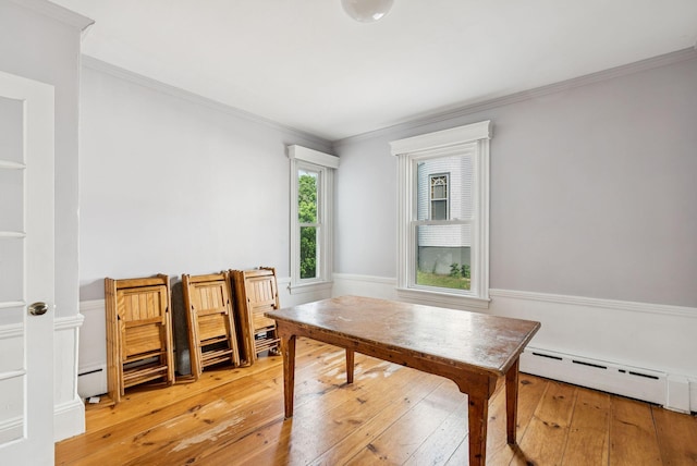201 Main St, Norway, ME 04268 - office area featuring a baseboard heating unit, light wood finished floors, and crown molding