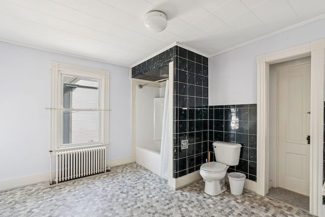 201 Main St, Norway, ME 04268 - full bathroom featuring radiator, tile walls, crown molding, and bathtub / shower combination