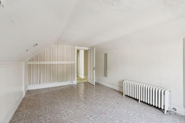 201 Main St, Norway, ME 04268 - bonus room featuring radiator heating unit and lofted ceiling