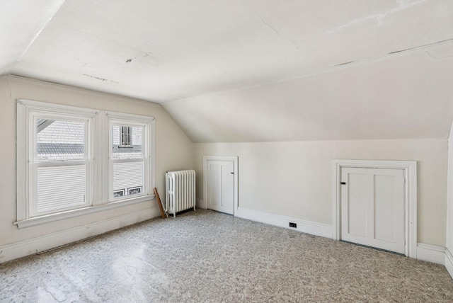 201 Main St, Norway, ME 04268 - bonus room with radiator, vaulted ceiling, and carpet floors