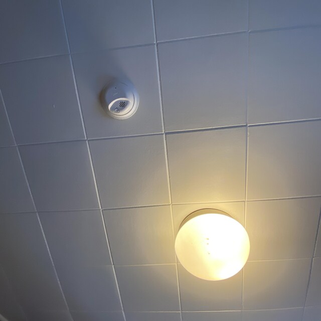 323 Pine St, Dover-Foxcroft, ME 04426 - detailed view of a smoke detector