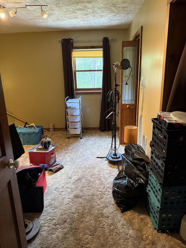 333 Mohawk Rd, Enfield, ME 04493 - carpeted bedroom featuring a textured ceiling
