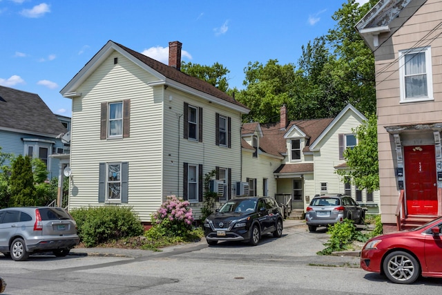120 Holland St, Lewiston, ME 04240 - view of front of home with a chimney