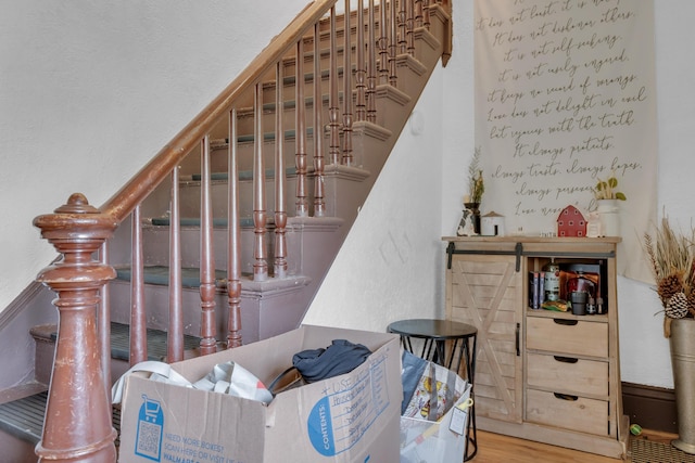120 Holland St, Lewiston, ME 04240 - stairway featuring wood finished floors