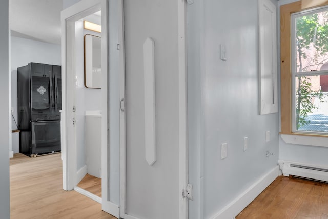 120 Holland St, Lewiston, ME 04240 - bathroom featuring wood finished floors and baseboard heating