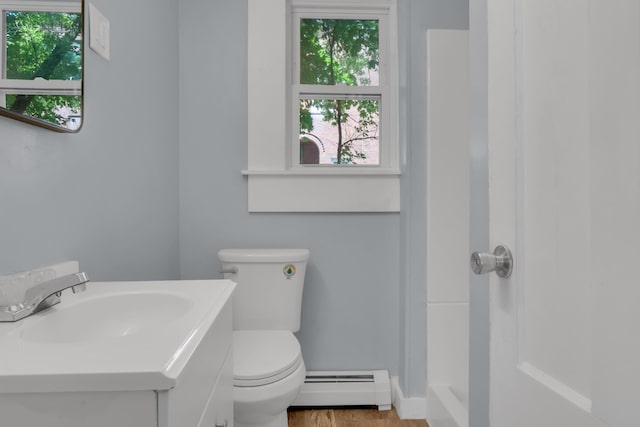 120 Holland St, Lewiston, ME 04240 - full bath with a baseboard radiator, healthy amount of natural light, a shower, and vanity