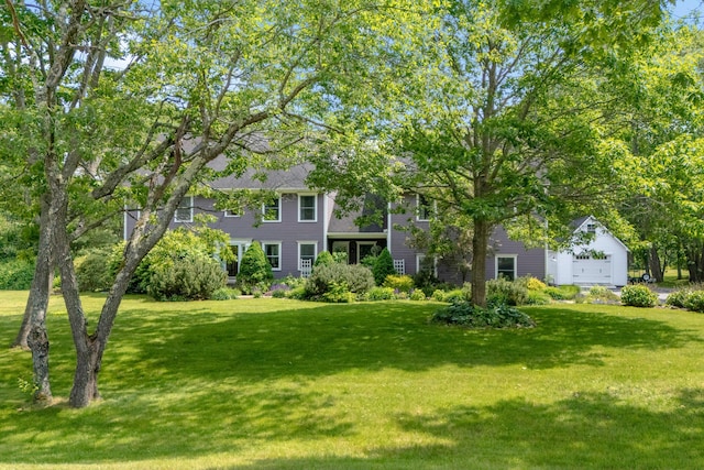 6 Ocean View Dr, Biddeford, ME 04005 - view of grassy yard with a garage
