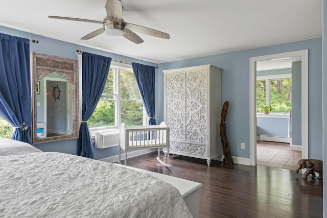 6 Ocean View Dr, Biddeford, ME 04005 - bedroom with baseboard heating, wood finished floors, and ceiling fan