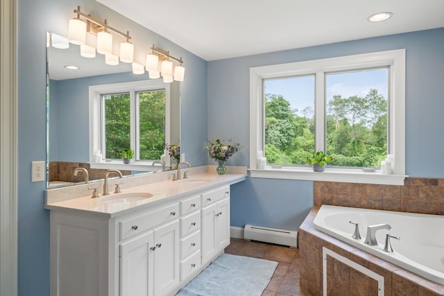 6 Ocean View Dr, Biddeford, ME 04005 - full bathroom with a baseboard radiator, double vanity, a bath, and tile patterned flooring