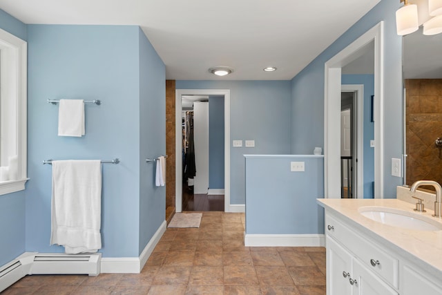 6 Ocean View Dr, Biddeford, ME 04005 - bathroom with vanity, a baseboard radiator, a tile shower, and recessed lighting