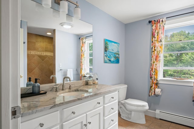 6 Ocean View Dr, Biddeford, ME 04005 - full bathroom featuring a baseboard radiator, tile patterned floors, vanity, and healthy amount of natural light