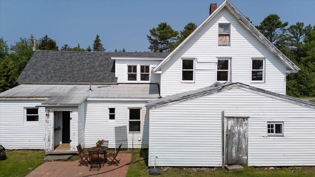 3 Salt Pond Rd, Friendship, ME 04547 - back of house featuring a patio and a chimney