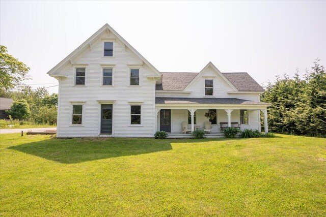 3 Salt Pond Rd, Friendship, ME 04547 - view of front of house featuring covered porch, a front yard, and roof with shingles