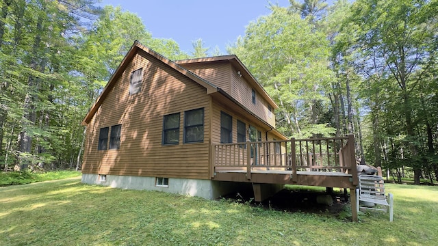 105 Highland Pines Rd, Bridgton, ME 04009 - view of side of property with a wooden deck and a lawn