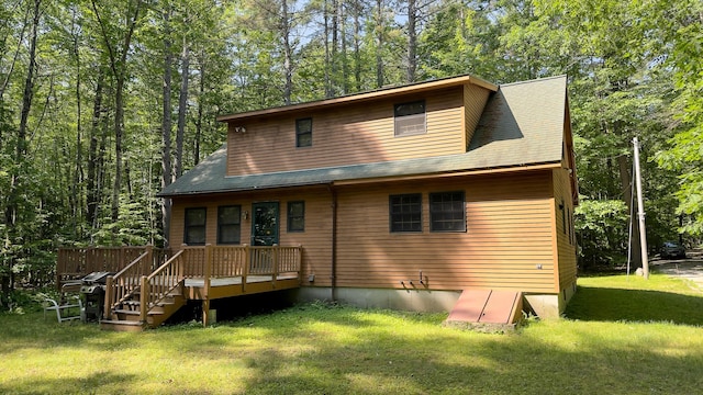 105 Highland Pines Rd, Bridgton, ME 04009 - back of house with a lawn and roof with shingles