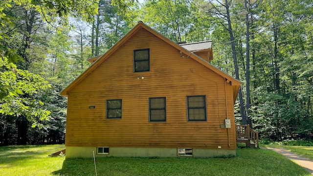 105 Highland Pines Rd, Bridgton, ME 04009 - view of property exterior featuring a lawn