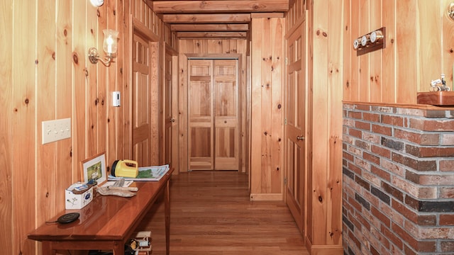 105 Highland Pines Rd, Bridgton, ME 04009 - hallway with wooden walls and wood finished floors