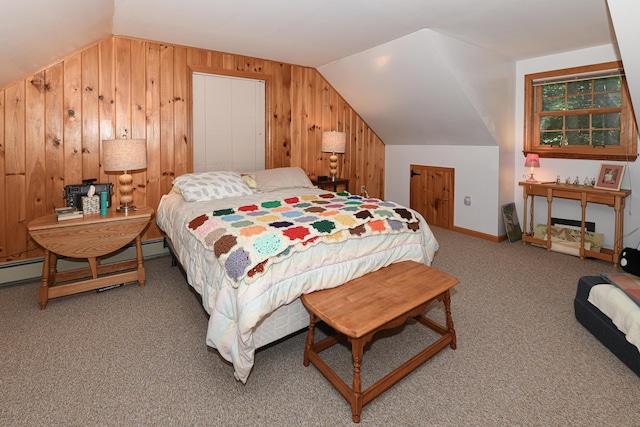 105 Highland Pines Rd, Bridgton, ME 04009 - carpeted bedroom with vaulted ceiling, wood walls, and a baseboard heating unit