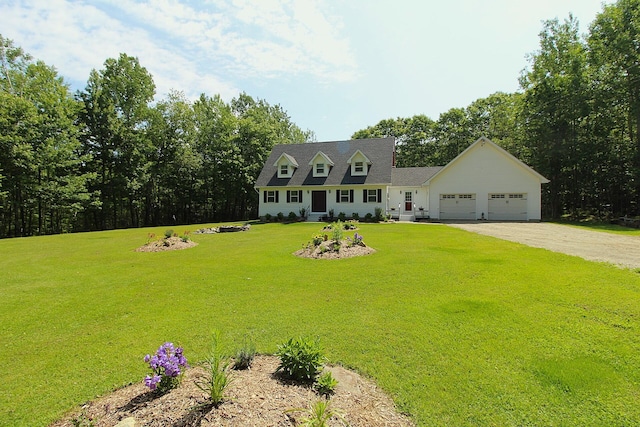 429 Moosehead Trail Highway, Waldo, ME 04915 - cape cod home with a garage, dirt driveway, and a front yard