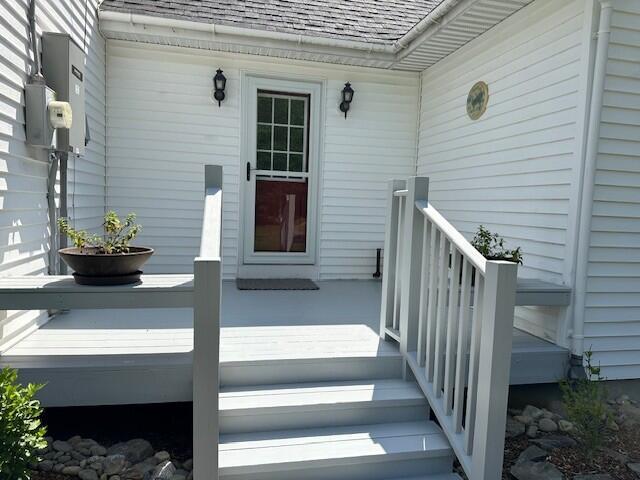 429 Moosehead Trail Highway, Waldo, ME 04915 - property entrance with roof with shingles