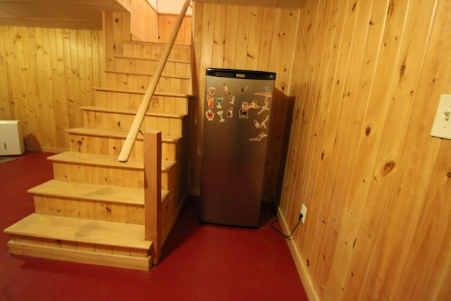 429 Moosehead Trail Highway, Waldo, ME 04915 - stairs with wood walls and carpet