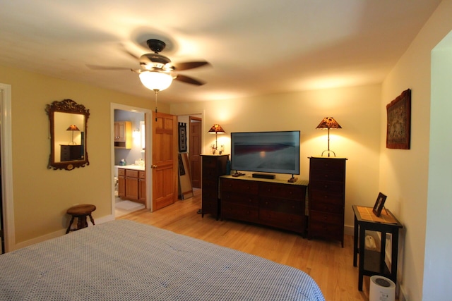 429 Moosehead Trail Highway, Waldo, ME 04915 - bedroom featuring light wood-style floors, a ceiling fan, and ensuite bathroom