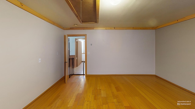 37 Mill St, Enfield, ME 04493 - spare room with attic access and light wood-type flooring