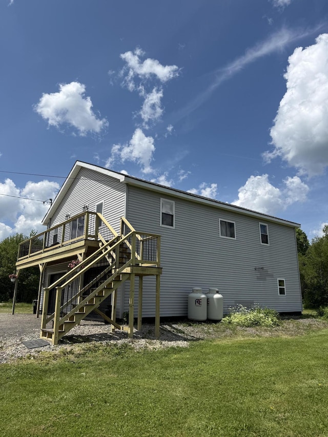 37 Mill St, Enfield, ME 04493 - back of property with stairs, a deck, and a yard