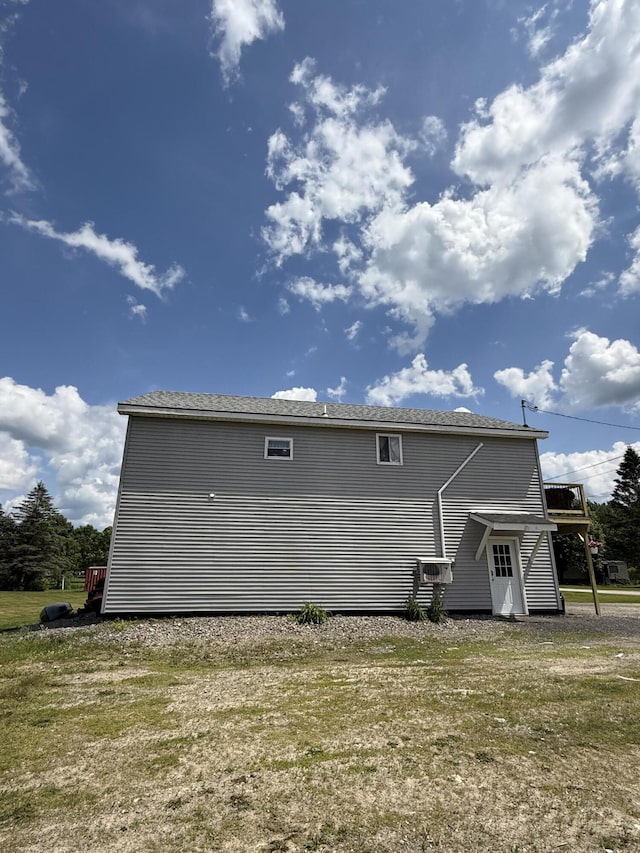 37 Mill St, Enfield, ME 04493 - rear view of property featuring a lawn and cooling unit
