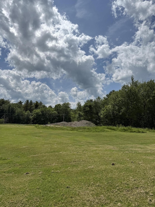 37 Mill St, Enfield, ME 04493 - view of green lawn featuring a rural view and a forest view