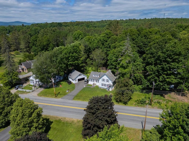 210 Middle St, Farmington, ME 04938 - aerial view of property and surrounding area featuring a forest