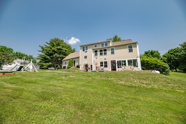 3 Pondview Dr, Lewiston, ME 04240 - back of house featuring a lawn and a playground