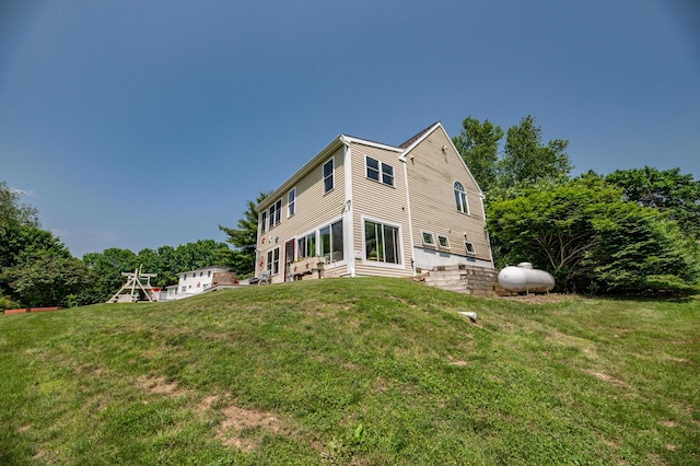3 Pondview Dr, Lewiston, ME 04240 - back of house with entry steps and a yard