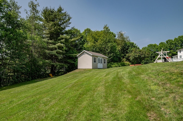 3 Pondview Dr, Lewiston, ME 04240 - view of green lawn with an outbuilding