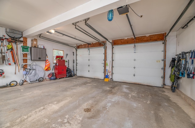 3 Pondview Dr, Lewiston, ME 04240 - garage with a garage door opener