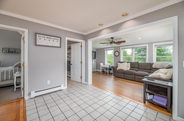 3 Pondview Dr, Lewiston, ME 04240 - living area featuring baseboard heating, light tile patterned floors, ornamental molding, and ceiling fan