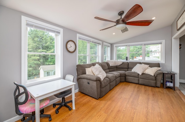 3 Pondview Dr, Lewiston, ME 04240 - living area with lofted ceiling, light wood-style flooring, ceiling fan, and plenty of natural light