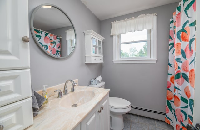 3 Pondview Dr, Lewiston, ME 04240 - bathroom featuring baseboard heating, vanity, tile patterned flooring, and curtained shower