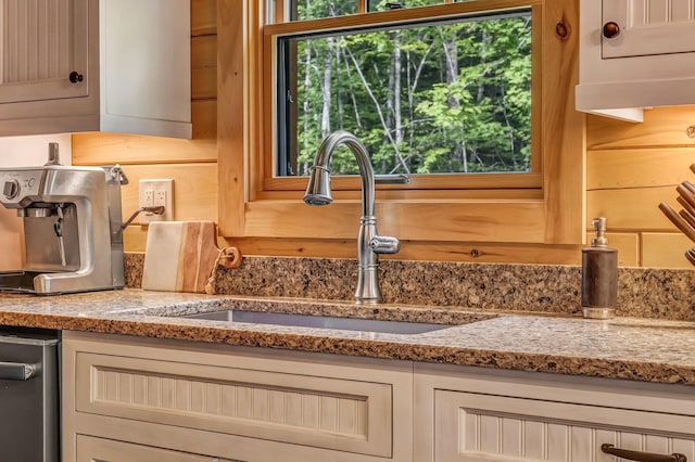 37 Parkhill Point Rd, Belgrade, ME 04917 - kitchen view of decorative backsplash, light stone counters, and dishwasher