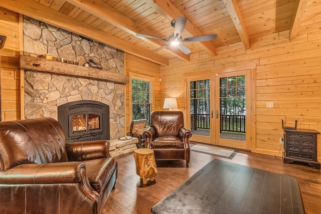 37 Parkhill Point Rd, Belgrade, ME 04917 - living area with a wood ceiling with exposed beams, wooden walls, hardwood / wood-style floors, french doors, and ceiling fan