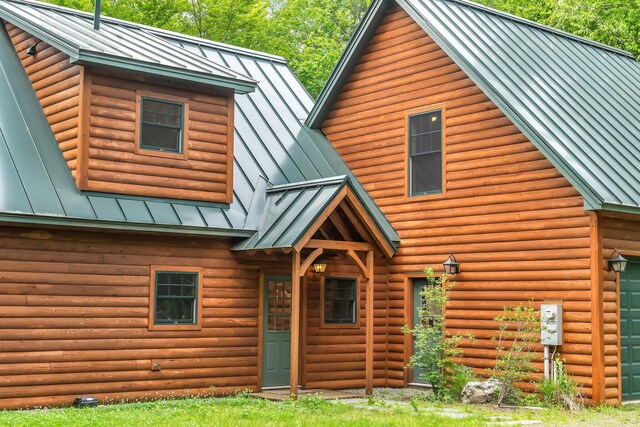 37 Parkhill Point Rd, Belgrade, ME 04917 - view of front of home featuring a standing seam roof and a metal roof