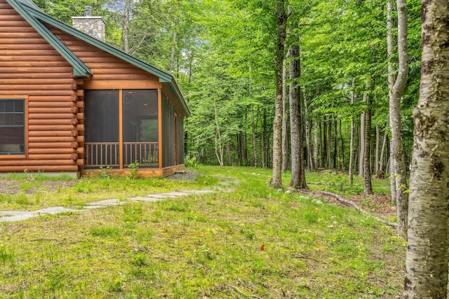 37 Parkhill Point Rd, Belgrade, ME 04917 - view of yard featuring a sunroom and a view of trees