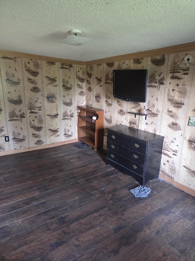 192 Old Bangor Rd, Newport, ME 04953 - unfurnished living room featuring wood-type flooring, a textured ceiling, and ornamental molding