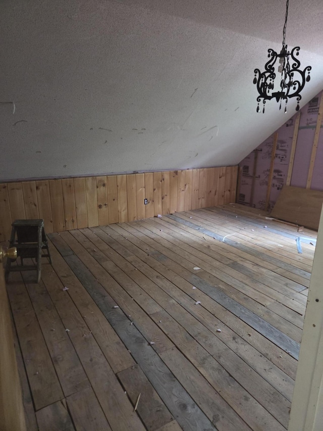 192 Old Bangor Rd, Newport, ME 04953 - bonus room with vaulted ceiling, wood-type flooring, and a textured ceiling