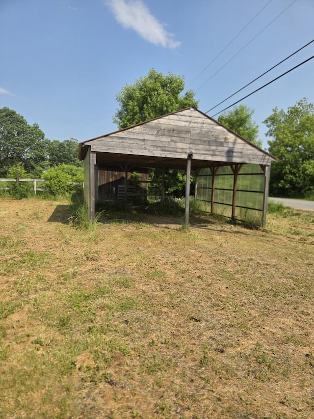 192 Old Bangor Rd, Newport, ME 04953 - view of grassy yard with a pole building and a detached carport