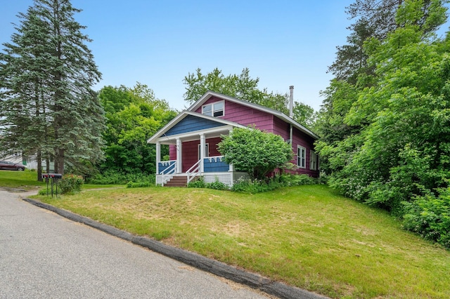 25 Foch St, Lewiston, ME 04240 - bungalow-style home with covered porch and a front yard